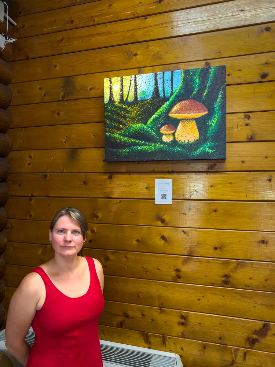 Keili Major with the painting Mushroom Hunt, Gallo di Monte, Garessio